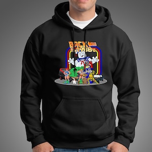 Return to the iconic design of the 1980s with this retro hoodie, showcasing a mashup of beloved characters such as Transformers, ET, He-Man.