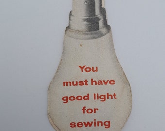 You must have good light for sewing - GEC Osram needle packet, c. 1940s
