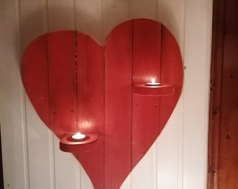 Decoration heart for hanging from recycled wood with tea light holder