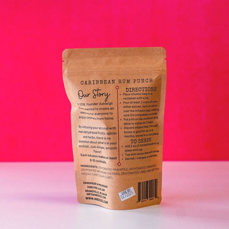 May include: A brown paper pouch with a label that reads "Caribbean Rum Punch" and includes instructions for infusing rum with dehydrated fruits, spices, and herbs. The label also includes a list of ingredients, such as dehydrated pineapple, oranges, cherries, limes, and bitter infused cane sugar cubes.