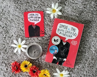 Simon Vs. La Portada del Mini libro de la Agenda Homo Sapiens