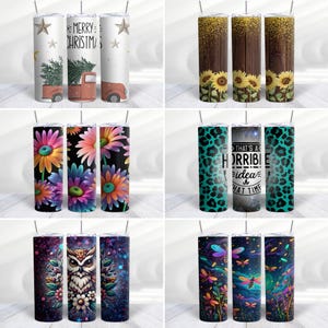 May include: Set of three 20 oz stainless steel tumblers with various designs. The designs include a Christmas scene with a truck and trees, a floral pattern, a leopard print with the text "That's a horrible idea, what time", a galaxy design with an owl, and a galaxy design with dragonflies.