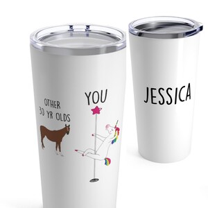 May include: White stainless steel tumbler with a unicorn and a horse graphic. The text on the tumbler reads "You" and "Other 30 yr olds". The other tumbler is white and says "Jessica" on it.