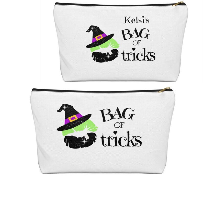 May include: White zippered pouch with a black and green witch's hat and lips with glitter. The text reads "Kelsi's Bag of tricks".