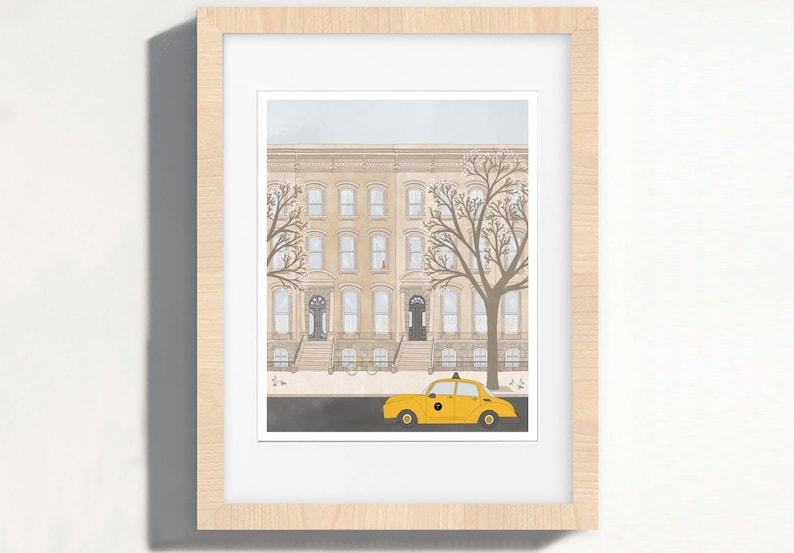 May include: A yellow taxi cab is parked in front of a row of brown brick buildings with windows. The buildings have a light gray trim and there are trees in front of the buildings.