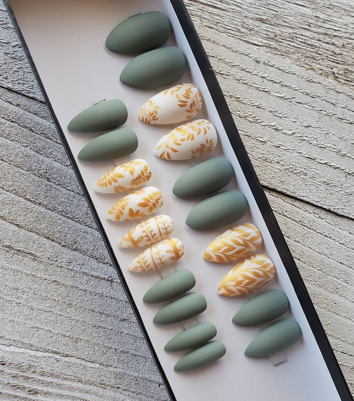 Sage green fake nails with gold leaves. Fake nails, false nails, faux…