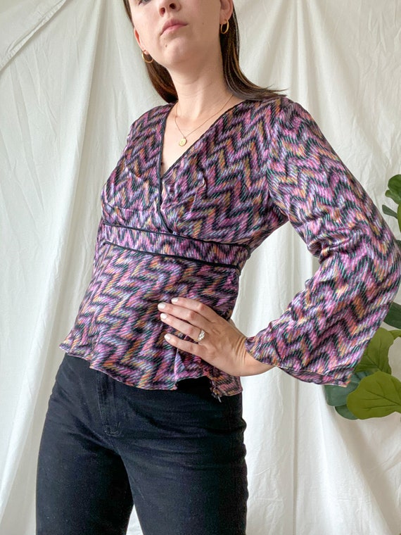 purple 70s shirt