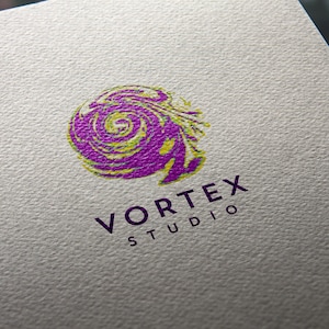 May include: A purple and yellow abstract swirl design with the text "VORTEX STUDIO" in purple below.