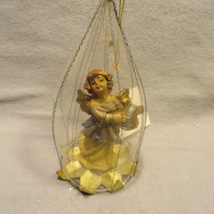Vintage Fantasy Collection &quot;Made in Germany&quot; Wire Wrapped Blown Glass Christmas Ornament - Angel Figurine inside Clear Glass Ornament