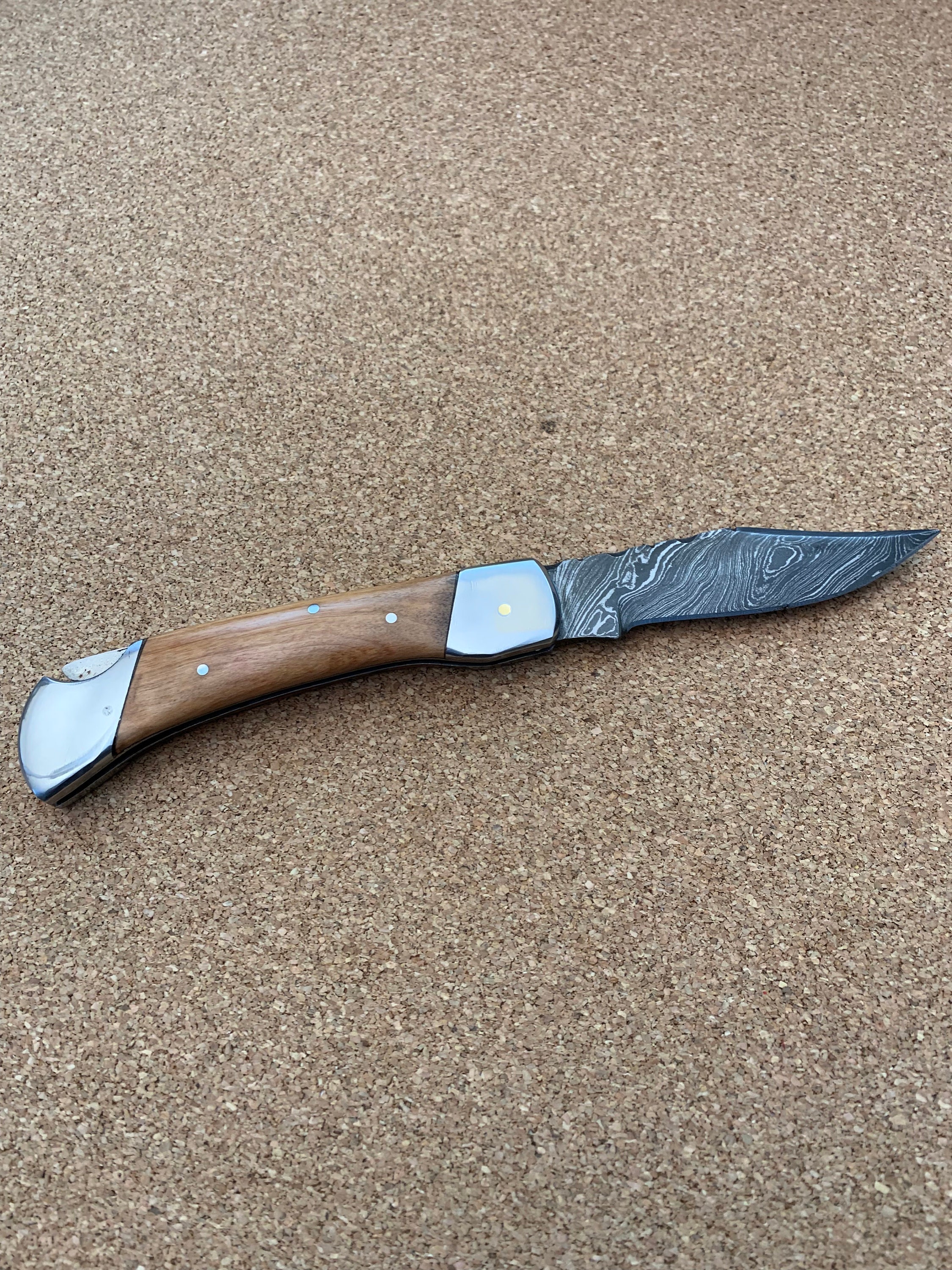 Serrated Spine 9 Collectors Personal Folding Knife with Olive Wood Handle