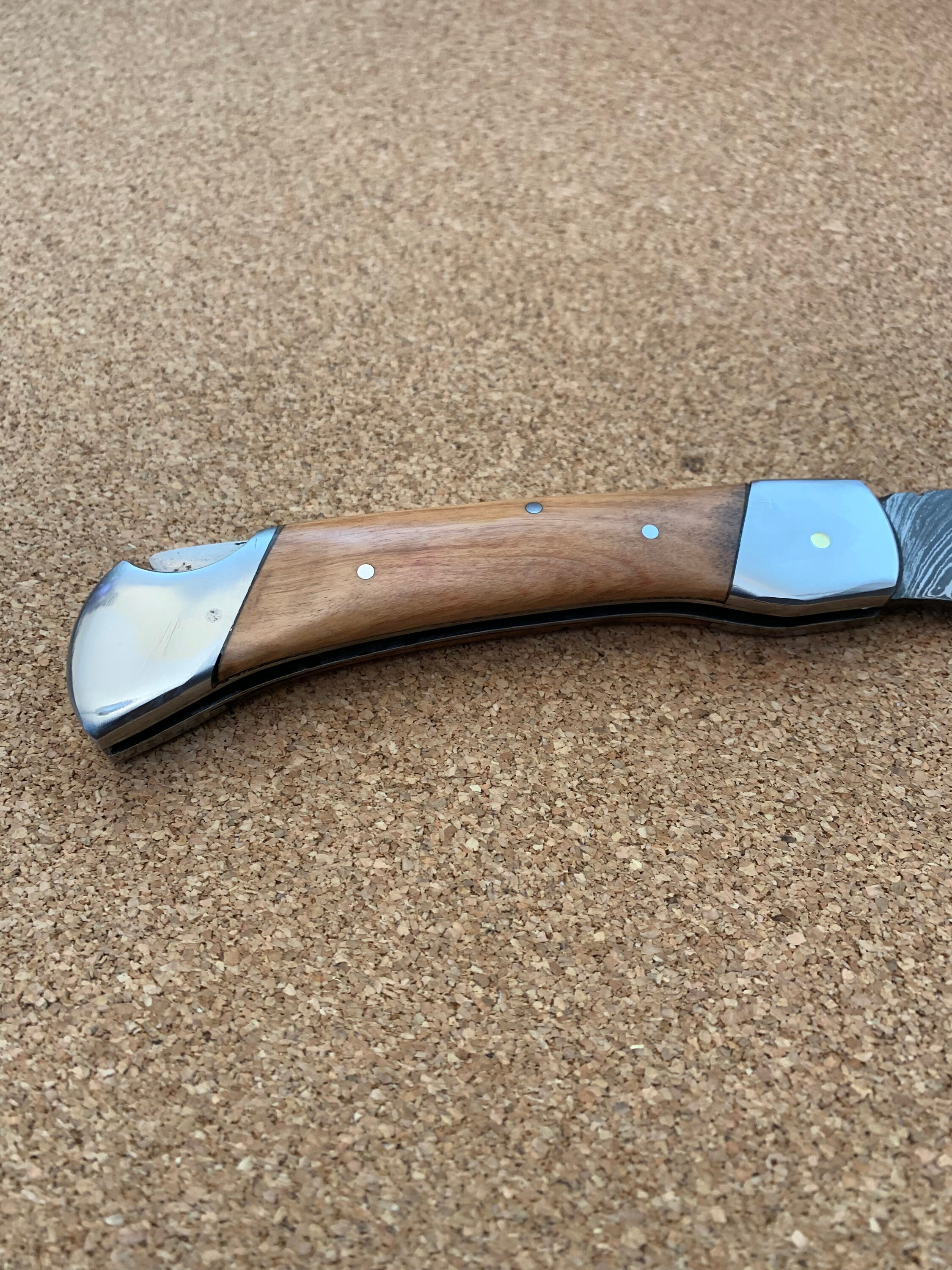 Serrated Spine 9 Collectors Personal Folding Knife with Olive Wood Handle