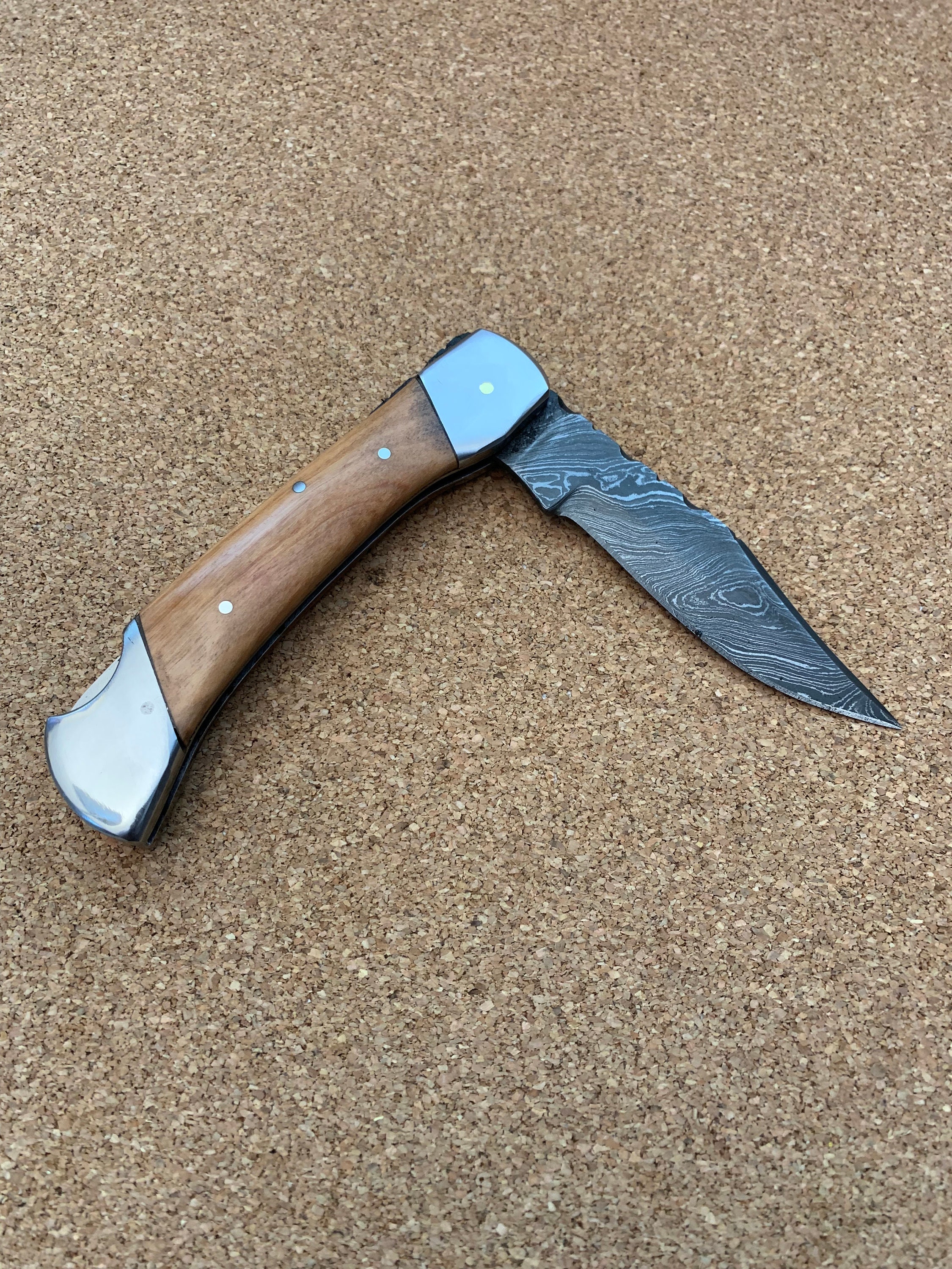 Serrated Spine 9 Collectors Personal Folding Knife with Olive Wood Handle