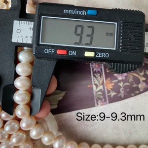 May include: A close-up of a pearl necklace measured with a caliper. The caliper reads 9.3 mm. The text "Size: 9-9.3mm" is visible below the necklace.