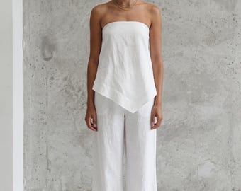 Completo coordinato in lino: top senza spalline e pantaloni a gamba larga.