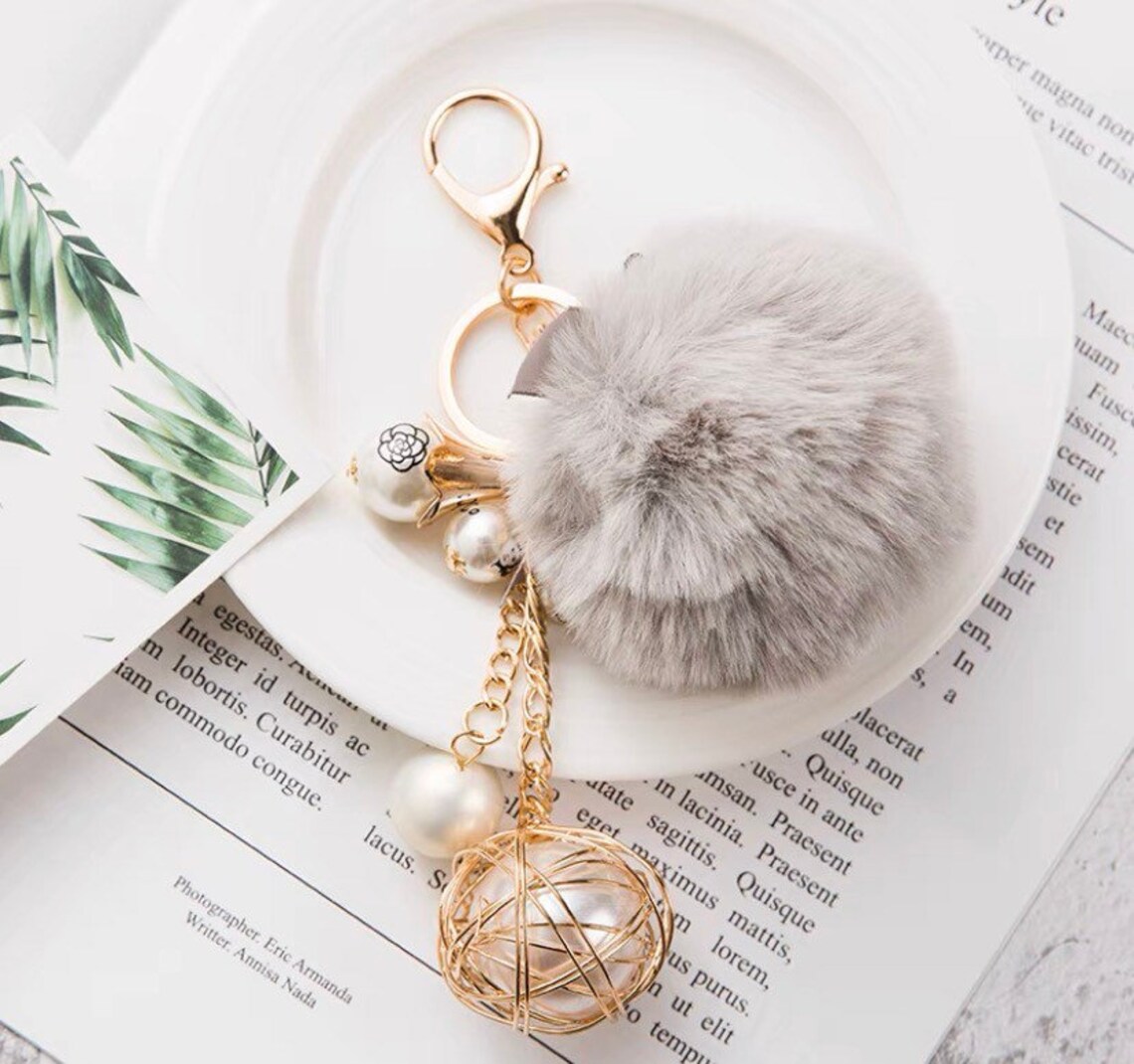 Fluffy puff ball Keychain multicolor with gold accents Etsy