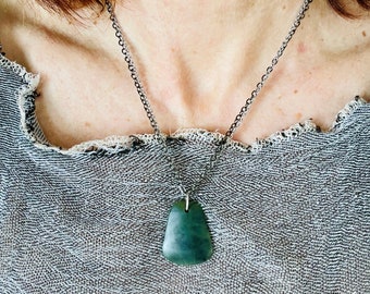 ARANGA 59 - New Zealand greenstone, pounamu, triangle shape on a mixed silver and black chain