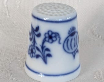 Vintage thimblewm from Eichwalder Porcelain Factory, Czech Republic. Porcelain with floral motif, white and blue.