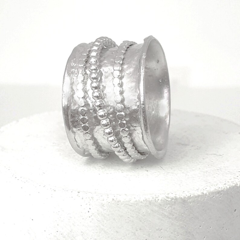 Spinner meditation ring Rhudiom plated ring with 3 dotted rings on top size 8.5