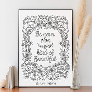 May include: Black and white printable art print with a floral frame and the quote "Be your own kind of beautiful" by Slavova Valeria.