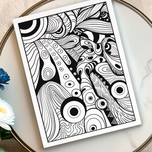 May include: Black and white abstract art print featuring a complex design of swirling lines, circles, and organic shapes. The artwork is displayed on a white background, creating a striking contrast. The print is suitable for home decor.