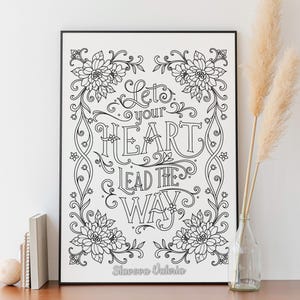 May include: Black and white printable art print with a floral design and the text "Let your heart lead the way" by Slavova Valeria.