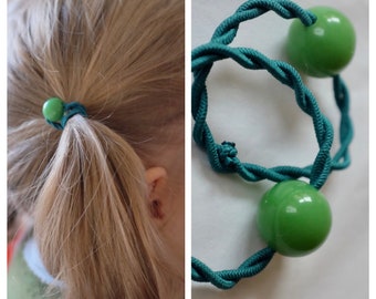 Pair of hair rubbers / braided rubbers, green