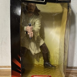 Novo na caixa Star Wars Qui-Gon Jinn Mega colecionável Applause