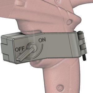 Puede incluir: Un interruptor de palanca de plástico gris con las palabras "ON" y "OFF" impresas en él. El interruptor está montado en un objeto de plástico gris más grande.