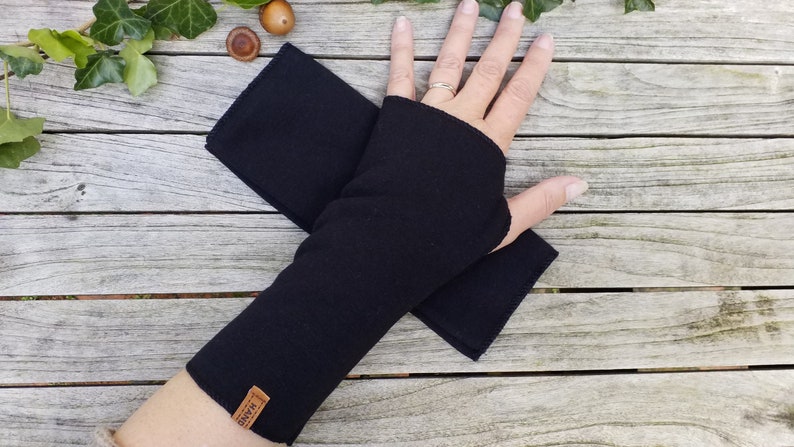CUFFS made of black alpine fleece with a cozy thumb hole image 1