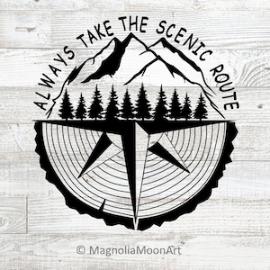 May include: Black and white graphic design with a compass, mountains, and trees. The text "Always Take The Scenic Route" is written around the design.