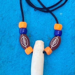 Gators-voetbal! Echte Gator-tandketting UF voetbalthema