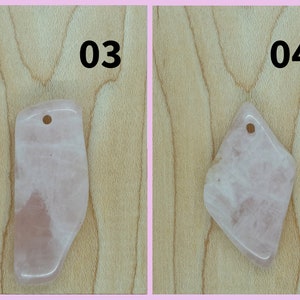 May include: Two pink rose quartz pendants with a hole at the top for stringing. The pendants are on a light wood background. The numbers 03 and 04 are visible in the top corners of the image.