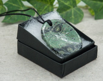 Kambaba Worry Thumb Stone Pendants with cordage of your choice.