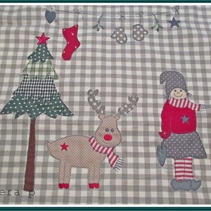 May include: A gray and white checkered fabric with a Christmas theme. The fabric features a green Christmas tree, a red and white striped stocking, a red and white striped reindeer, a gray and white gnome, and a string of white mittens.