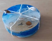 Coasters of resin made with beautiful image, sea and shells.