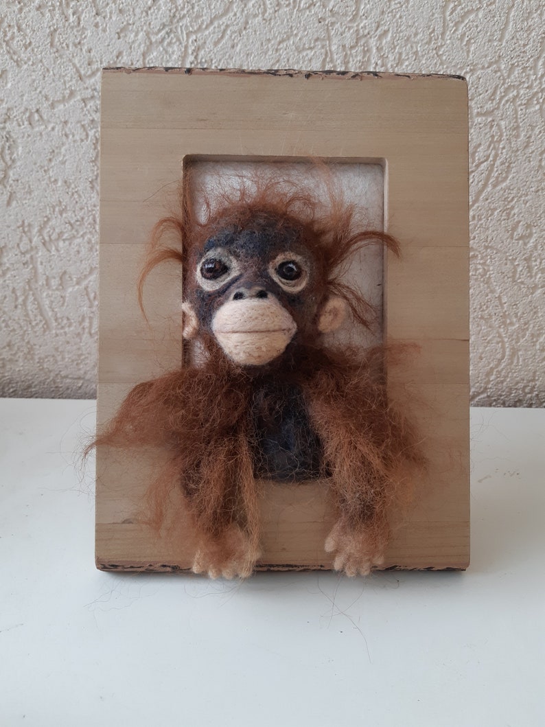 made in a painting Oerang oetan baby felted With the handmade.