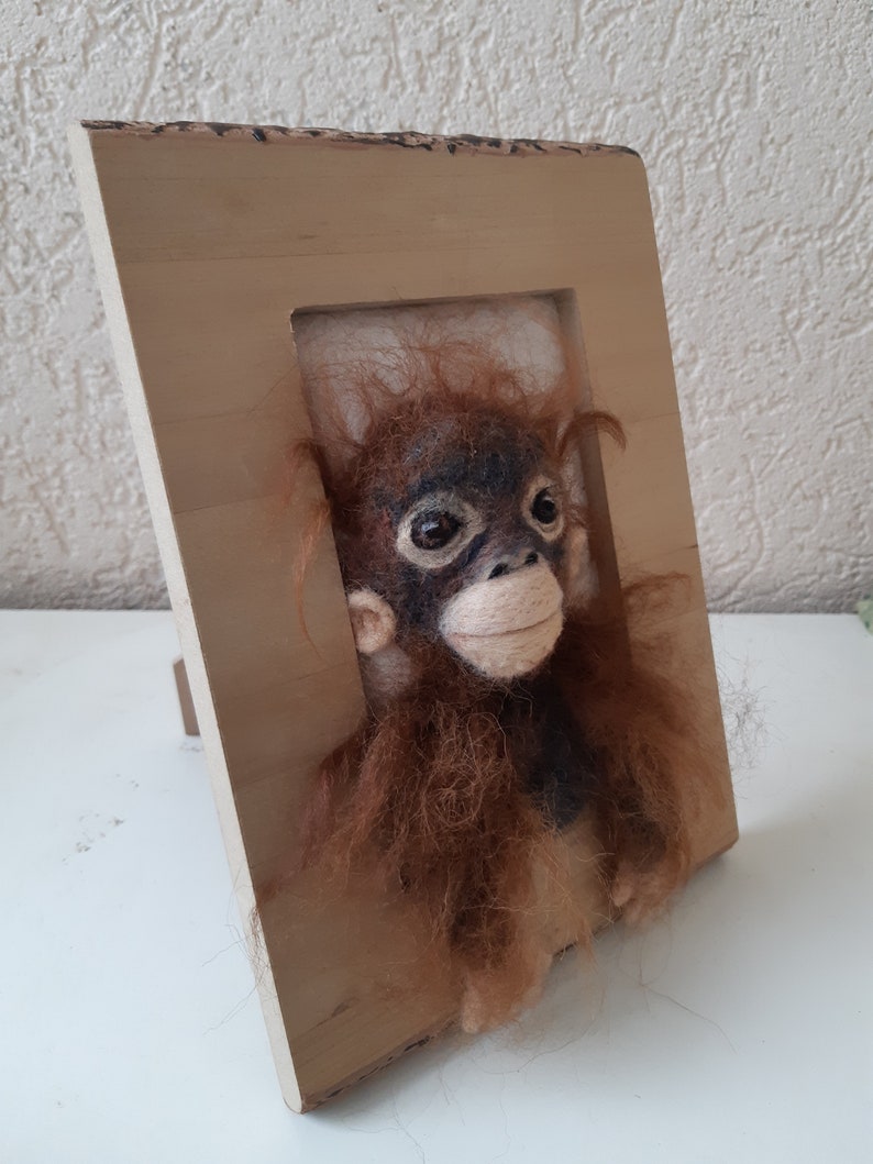 made in a painting Oerang oetan baby felted With the handmade.