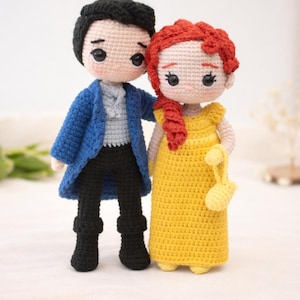 May include: A white ceramic mug with a black handle and the text "But First, Coffee" in a black, bold font. The mug is on a white surface. The mug is approximately 4 inches tall.