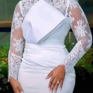 アフリカの女性のレースのドレス、アフリカの女性の衣類、アフリカの女性のドレス、アフリカの女性のファッション、アフリカの女性の服装。