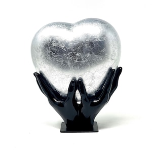 Comforting Hands Silver Heart Cremation Urn for Ashes is a Heart shape Container Fibreglass Urn for Ashes