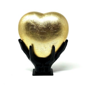 Comforting Hands Gold Colour Heart Cremation Urn for Ashes is a Heart shape Container Fibreglass Urn for Ashes