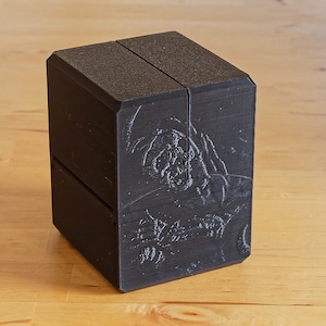 STL files for black 100 card (Commander) geared deck box with magnetic latch.