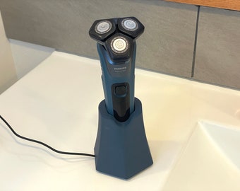 Charging stand for Philips series 5000 series electric shavers.