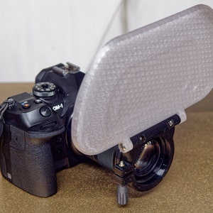 Universal compact macro flash diffuser panel.