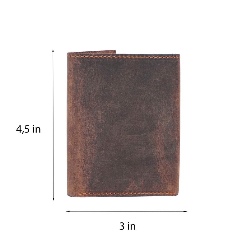 May include: A brown leather wallet with a distressed finish. It measures 4.5 inches tall and 3 inches wide.