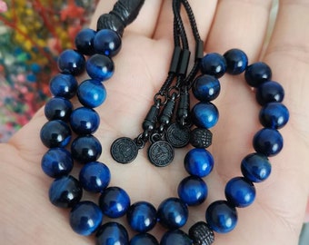 Tasbih Olho de Tigre Azul: Terço de oração muçulmano com 33 contas e borla preta.