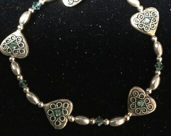 Sterling Silver Beaded Stretch Bracelet with Green Crystals Accented with Silver Hearts Adorned with Green Crystals