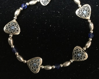 Sterling Silver Beaded Stretch Bracelet with Blue Crystals Accented with Silver Hearts Adorned with Blue Crystals