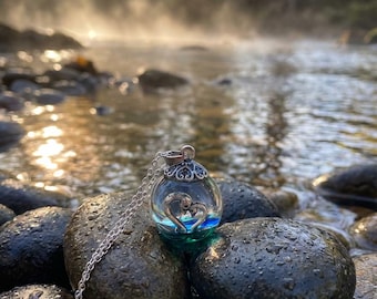 Swan Floating Heart Resin Orb Necklace: Sterling Silver Plated Chain
