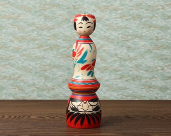 Kokeshi standing on Daruma, 17cm / 6.69inch in height, made by Teruyuki HIRAGA, Sakunami style kokeshi craftsman